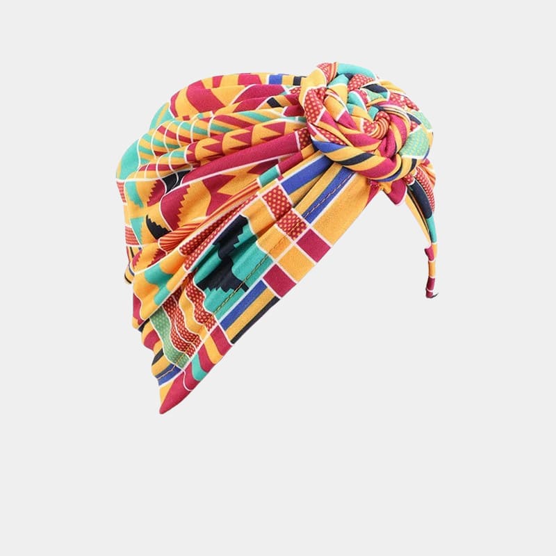 Turban motif africain orange avec nœud